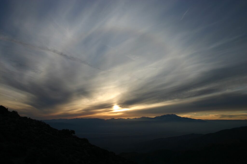A solar halo during Sunset is clearly visible. Keys View, Joshua Tree National Park, California, USA.